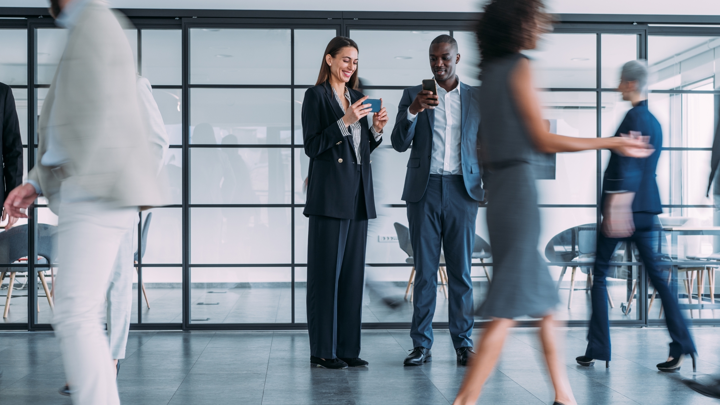People standing in a corporate office reviewing AI legal tech doom loop