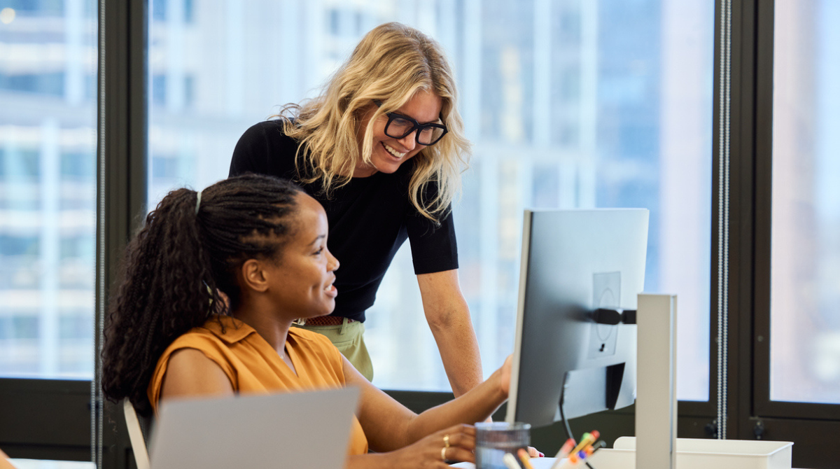 two women reviewing the terms and conditions of competitions with Instagram